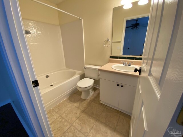 full bathroom with vanity, shower / tub combination, and toilet