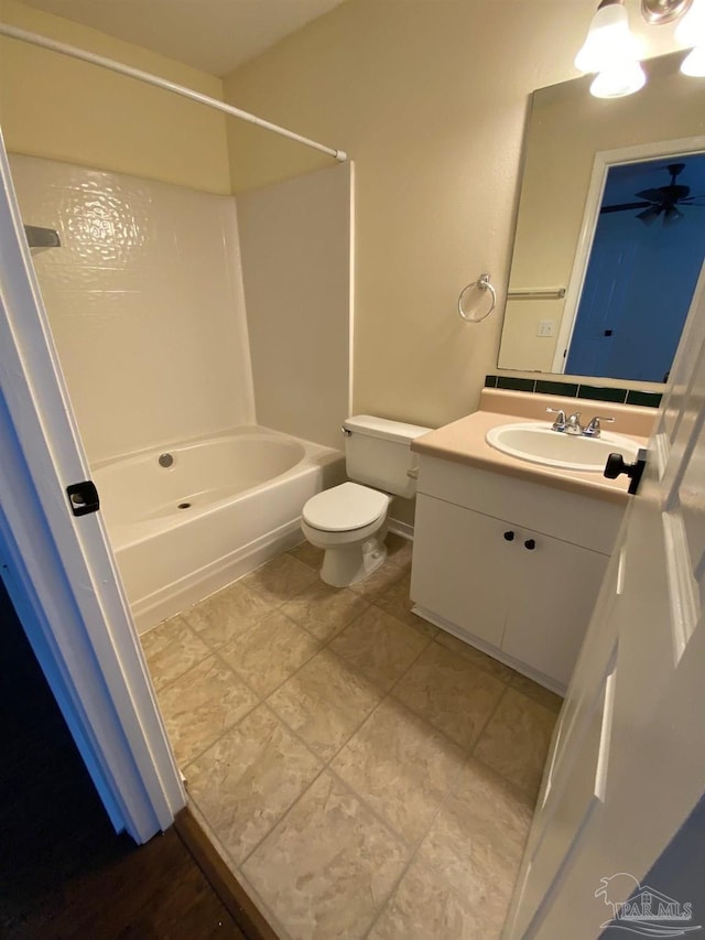 full bathroom with vanity, shower / washtub combination, and toilet