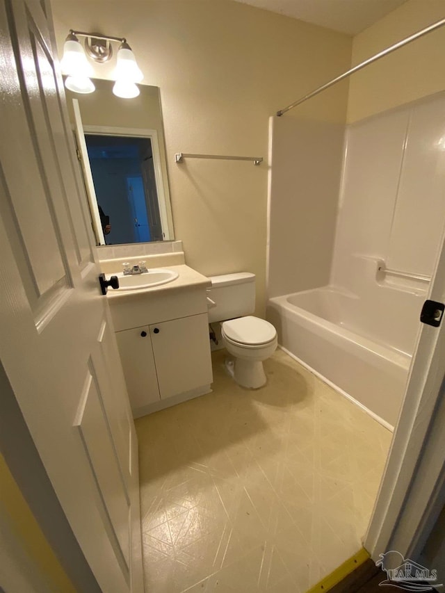 full bathroom with vanity,  shower combination, and toilet