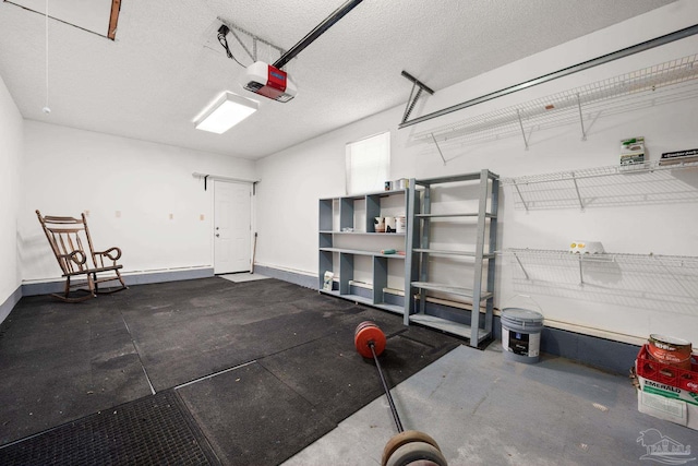 garage featuring baseboards and a garage door opener