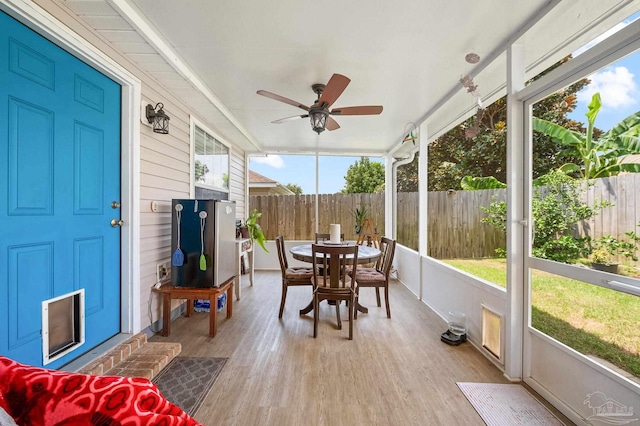 5590 Meadow Creek Pl, Gulf Breeze, FL 32563 - sunroom / solarium featuring a ceiling fan and outdoor dining space
