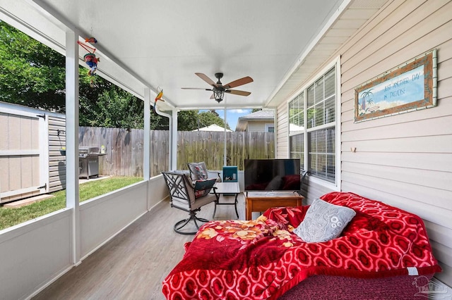 5590 Meadow Creek Pl, Gulf Breeze, FL 32563 - sunroom featuring ceiling fan and outdoor lounge area