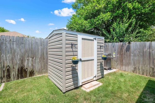5590 Meadow Creek Pl, Gulf Breeze, FL 32563 - view of shed featuring a fenced backyard