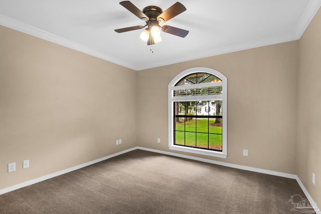 unfurnished room featuring carpet floors, crown molding, and ceiling fan