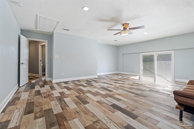 interior space with hardwood / wood-style flooring and ceiling fan