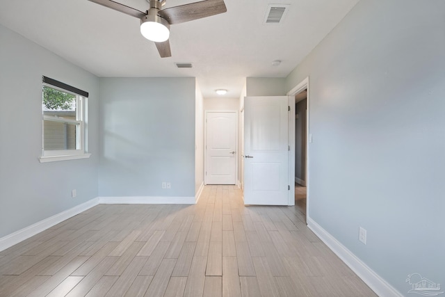 127 Windsor Pl, Gulf Breeze, FL 32561 - empty room featuring light wood-type flooring, visible vents, ceiling fan, and baseboards