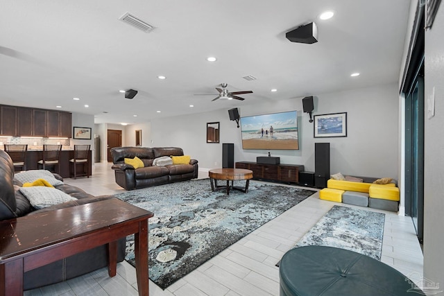 living room with ceiling fan