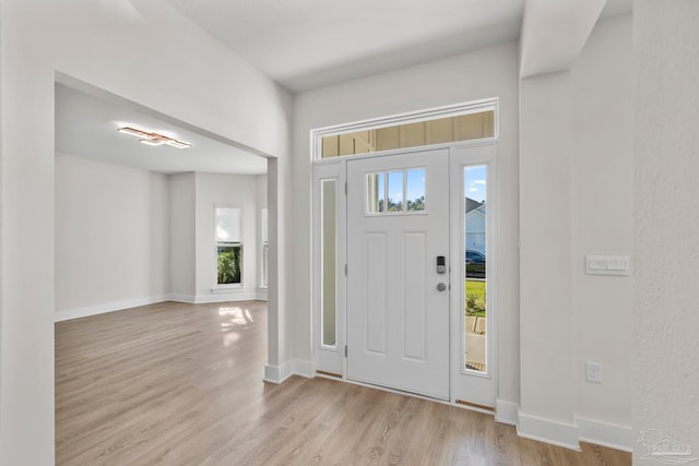 entrance foyer with light hardwood / wood-style floors