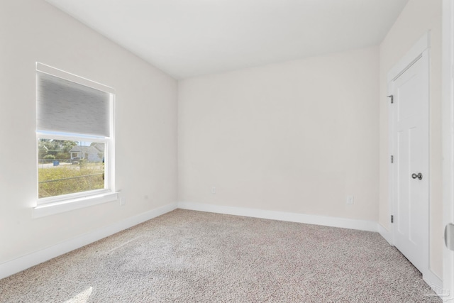 empty room with carpet flooring