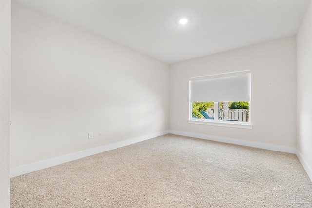 view of carpeted spare room