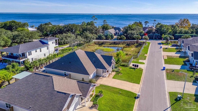 bird's eye view with a water view