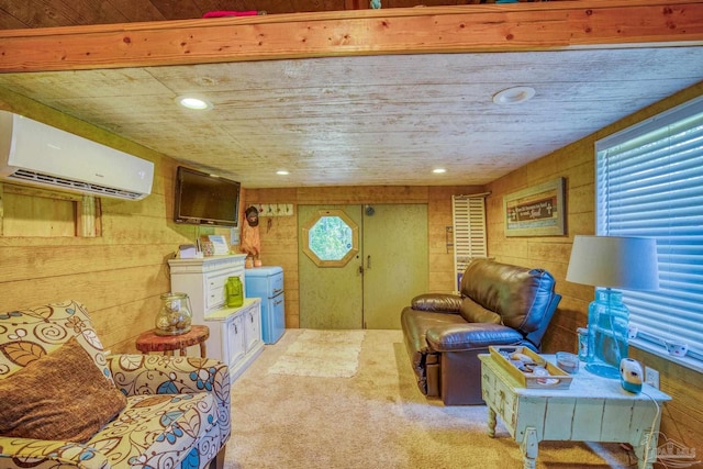 living room with an AC wall unit, wooden walls, and carpet flooring