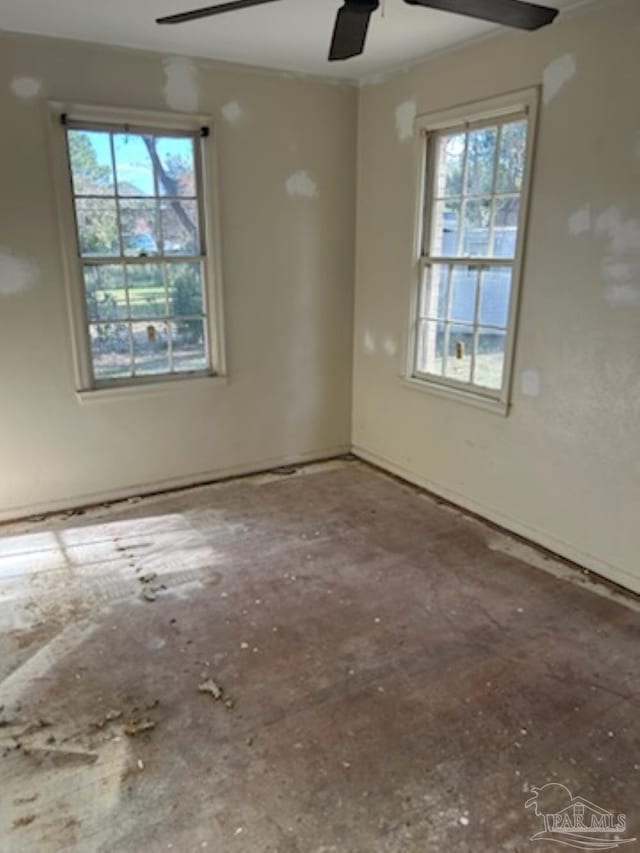 unfurnished room featuring ceiling fan