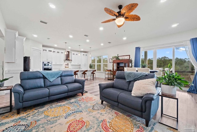 2032 Bay Point Blvd, Milton, FL 32583 - living room featuring light wood finished floors, recessed lighting, and a ceiling fan