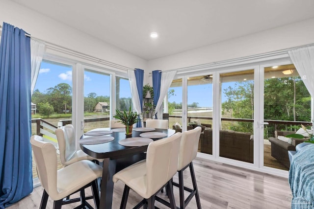 2032 Bay Point Blvd, Milton, FL 32583 - dining space with light wood-type flooring, plenty of natural light, and recessed lighting