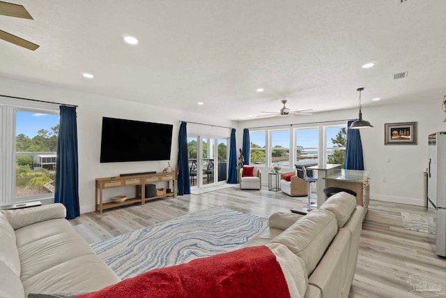 2032 Bay Point Blvd, Milton, FL 32583 - living room with ceiling fan, recessed lighting, and light wood finished floors