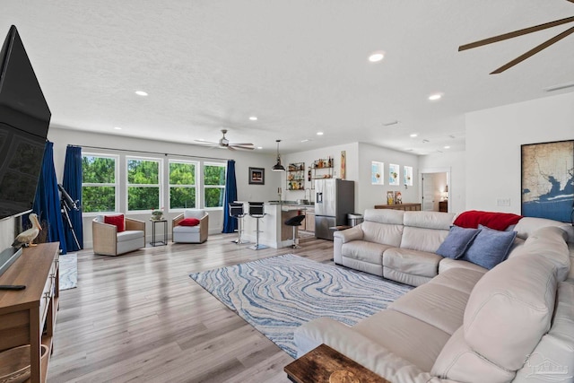 2032 Bay Point Blvd, Milton, FL 32583 - living area with ceiling fan, recessed lighting, and light wood finished floors