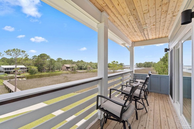 2032 Bay Point Blvd, Milton, FL 32583 - balcony with a water view and view of wooded area