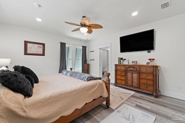 2032 Bay Point Blvd, Milton, FL 32583 - bedroom with wood finished floors, recessed lighting, and a ceiling fan