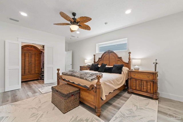 2032 Bay Point Blvd, Milton, FL 32583 - bedroom featuring light wood finished floors, recessed lighting, and ceiling fan