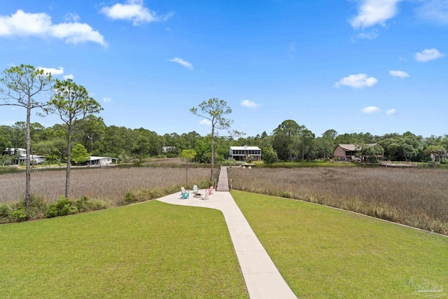 2032 Bay Point Blvd, Milton, FL 32583 - view of grassy yard with view of wooded area