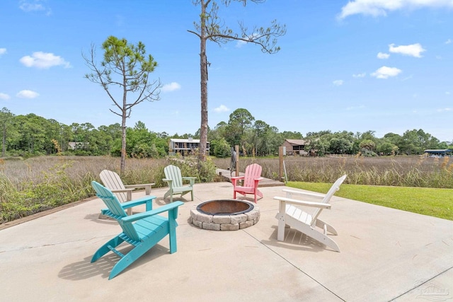 2032 Bay Point Blvd, Milton, FL 32583 - view of patio featuring a fire pit