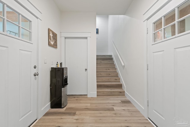 2032 Bay Point Blvd, Milton, FL 32583 - foyer entrance with stairway and light wood-style floors
