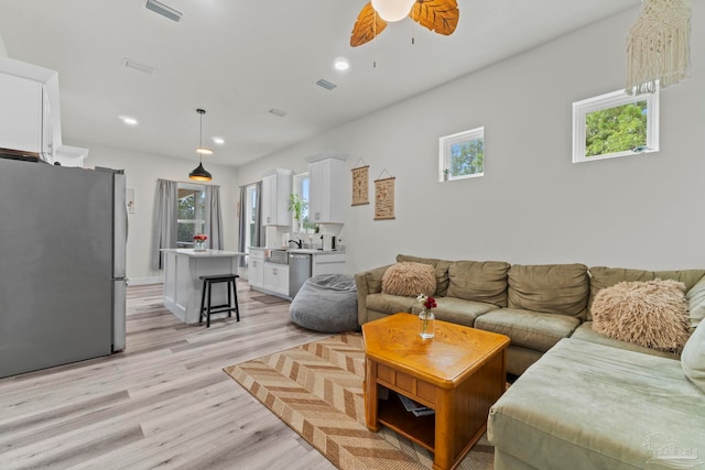 2032 Bay Point Blvd, Milton, FL 32583 - living area featuring ceiling fan, light wood-style flooring, healthy amount of natural light, and recessed lighting