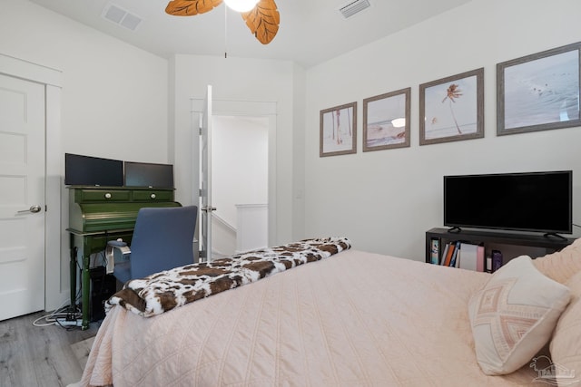 2032 Bay Point Blvd, Milton, FL 32583 - bedroom featuring wood finished floors and ceiling fan