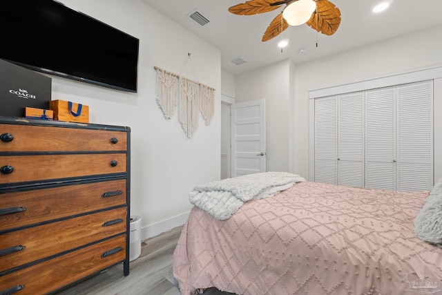 2032 Bay Point Blvd, Milton, FL 32583 - bedroom featuring light wood finished floors, a closet, ceiling fan, and recessed lighting
