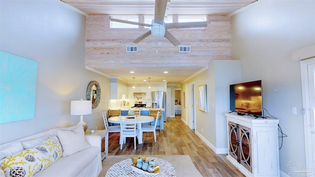 living room with ornamental molding, wood ceiling, ceiling fan, and hardwood / wood-style floors