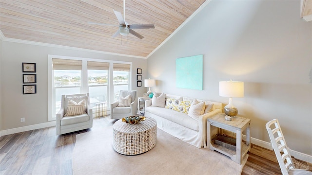 living room featuring wood ceiling, wood-type flooring, lofted ceiling, crown molding, and ceiling fan