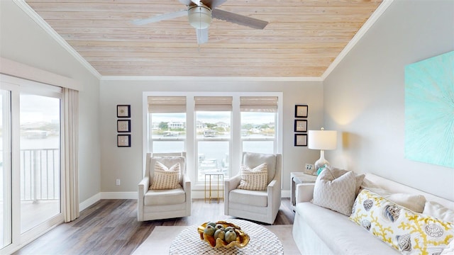 living room with wood-type flooring, wood ceiling, ornamental molding, and ceiling fan