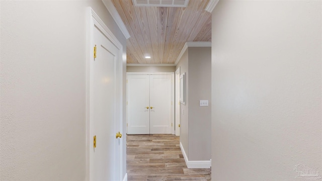 hallway featuring wooden ceiling and light wood-type flooring