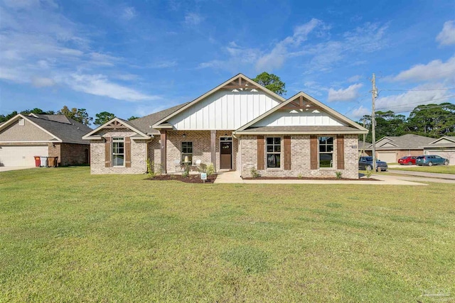 craftsman-style home featuring a front lawn and a garage