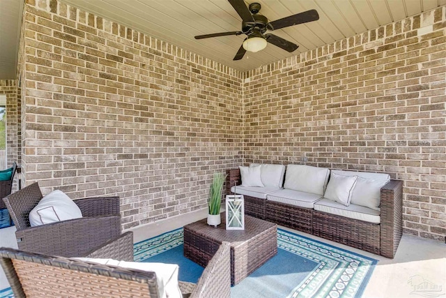 view of patio with outdoor lounge area and a ceiling fan