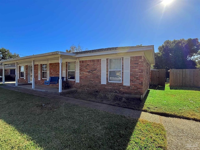 view of front of property with a front lawn