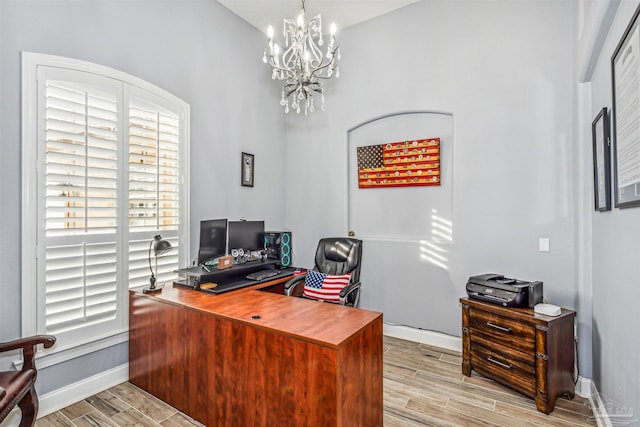 office featuring a chandelier