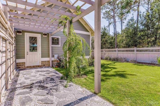 doorway to property with a pergola and a yard