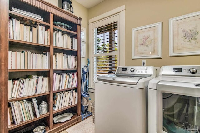 laundry room with washing machine and dryer