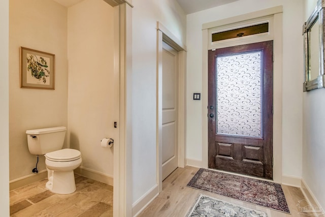 entrance foyer with light hardwood / wood-style flooring