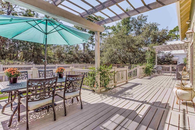 wooden terrace with a pergola