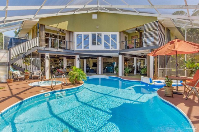 4552 Bayside Dr, Milton, FL 32583 - pool with a patio area, a lanai, and a ceiling fan