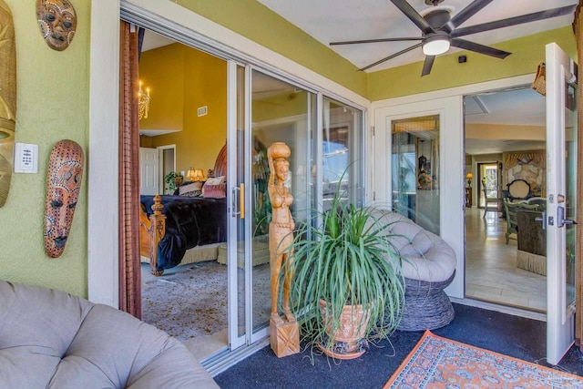 4552 Bayside Dr, Milton, FL 32583 - exterior space featuring stucco siding and ceiling fan
