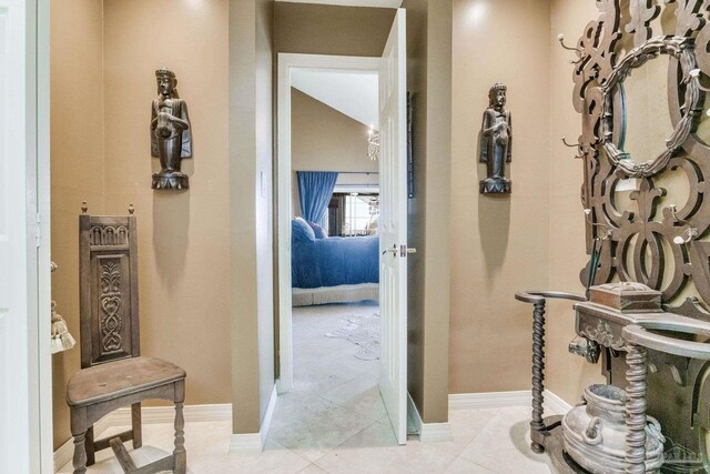 4552 Bayside Dr, Milton, FL 32583 - corridor with tile patterned flooring and baseboards