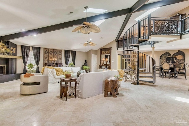 4552 Bayside Dr, Milton, FL 32583 - living area with beamed ceiling, high vaulted ceiling, a ceiling fan, stairway, and a skylight