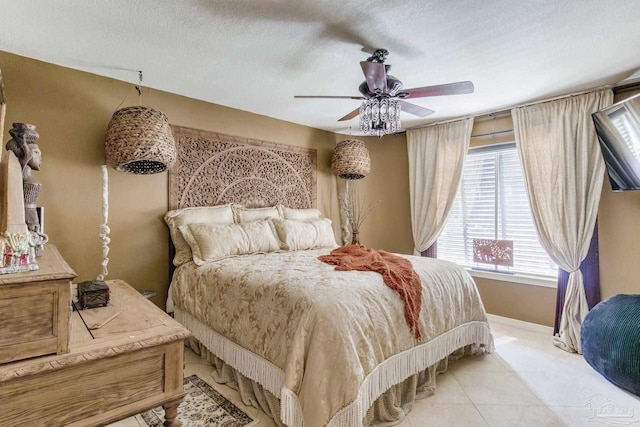 4552 Bayside Dr, Milton, FL 32583 - bedroom with a ceiling fan, baseboards, and a textured ceiling