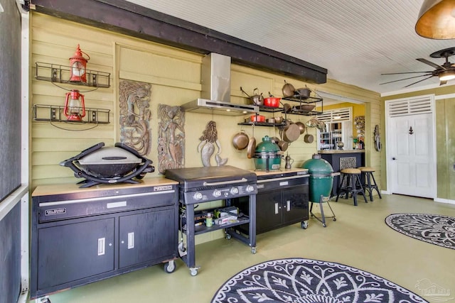 4552 Bayside Dr, Milton, FL 32583 - kitchen with finished concrete floors, wall chimney exhaust hood, and a ceiling fan