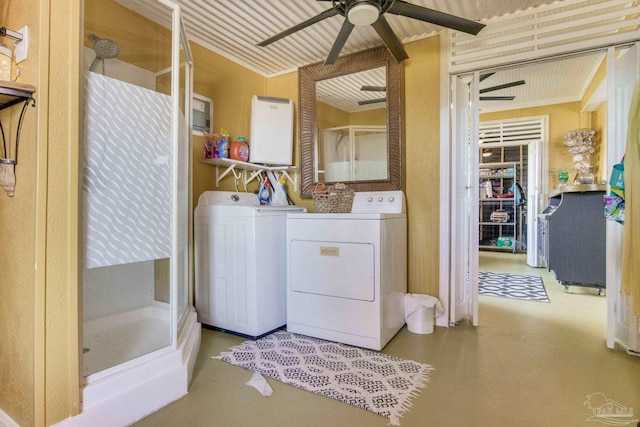 4552 Bayside Dr, Milton, FL 32583 - washroom with crown molding, ceiling fan, and separate washer and dryer