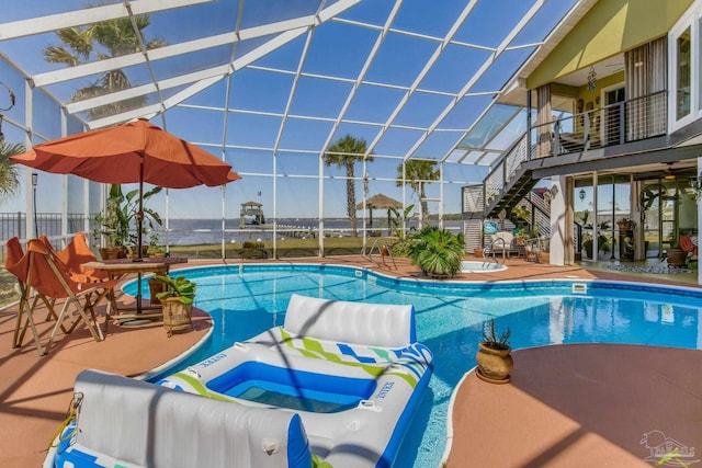4552 Bayside Dr, Milton, FL 32583 - outdoor pool featuring glass enclosure, a patio, and stairway